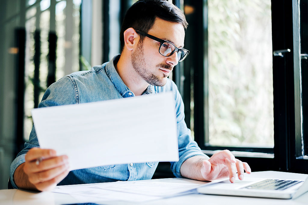 Serious pensive thoughtful focused young casual business account